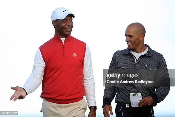 Marcus Allen and Kelly Slater on the 18th green during the third round of The Alfred Dunhill Links Championship at Kingsbarns Golf Links on October...