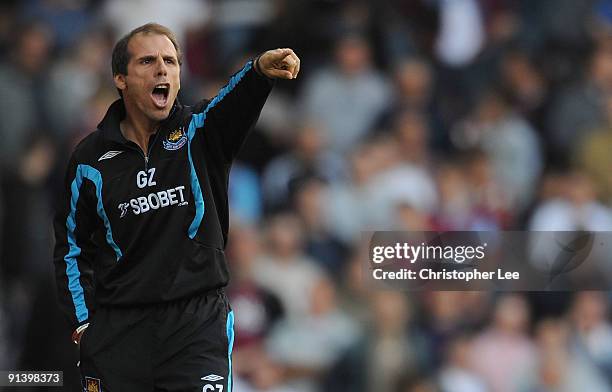 Manager Gianfranco Zola of West Ham directs his players during the Barclays Premier League match between West Ham United and Fulham at Upton Park on...