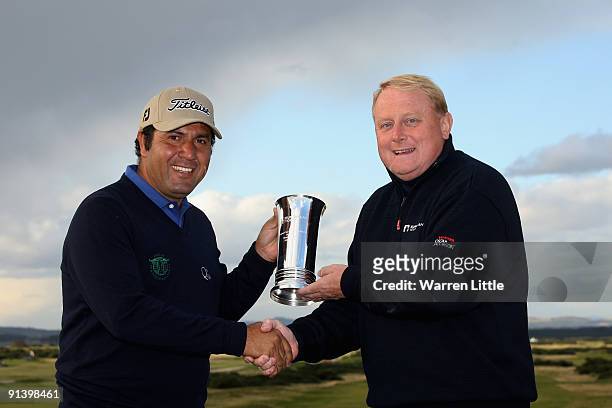 David Garland, Director of Tour Operations presents Ricardo Gonzalez of Argentina with the European Tour Shot of the Month for July during the third...