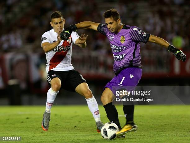 Rafael Santos Borre of River Plate and Jorge Carranza of Olimpo fight for the ball during a match between River Plate and Olimpo as part of Superliga...