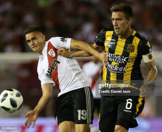 Rafael Santos Borre of River Plate and Matias Cahais battle for the ball during a match between River Plate and Olimpo as part of Superliga 2017/18...