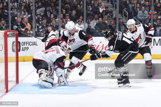 Alex Iafallo of the Los Angeles Kings shoots and scores against Scott Wedgewood of the Arizona Coyotes at STAPLES Center on February 3, 2018 in Los...