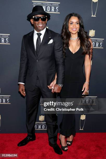 Former NFL Player Deion Sanders and Tracey Edmonds attends the NFL Honors at University of Minnesota on February 3, 2018 in Minneapolis, Minnesota.