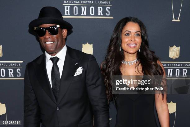 Former NFL Player Deion Sanders and Tracey Edmonds attends the NFL Honors at University of Minnesota on February 3, 2018 in Minneapolis, Minnesota.