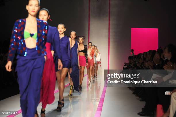Models walk the runway during Emmanuel Ungaro Pret a Porter show as part of the Paris Womenswear Fashion Week Spring/Summer 2010 at Le Carrousel du...