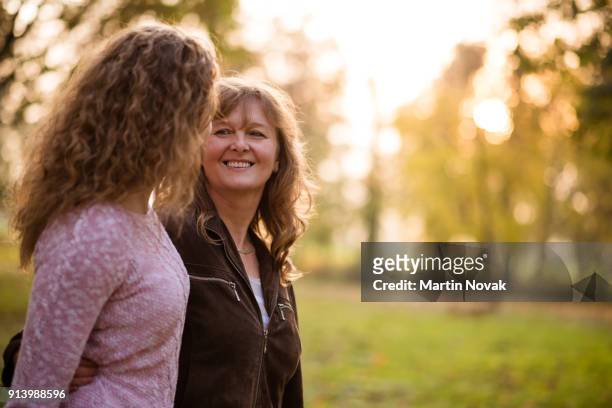 family spending quality time together - bokeh love stock pictures, royalty-free photos & images