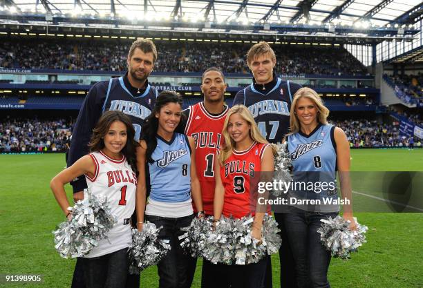 Players Mehmet Okur, Derrick Rose and Andrei Kirilenko and cheerleaders at half time during the Barclays Premier League match between Chelsea and...