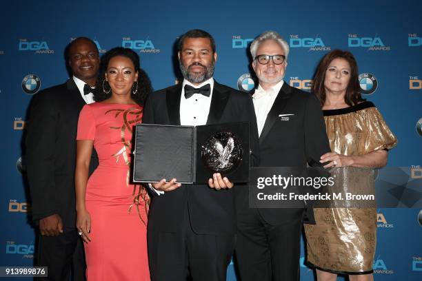 Actors Marcus Henderson and Betty Gabriel, director Jordan Peele, recipient of the Nomination Medallion for Outstanding Directorial Achievement in...