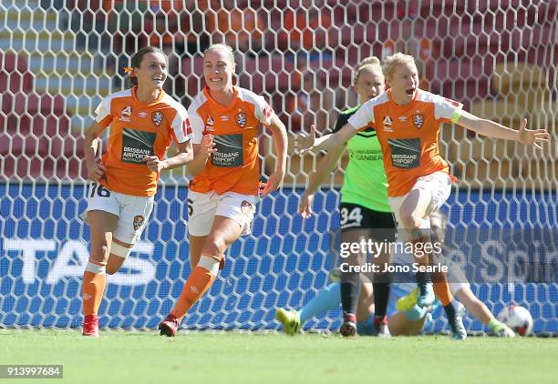 Brisbane player Hayley Raso celebrates her goal with team mate Celeste Boureille and Clare Polkinghorne during the round 14 W-League match between...