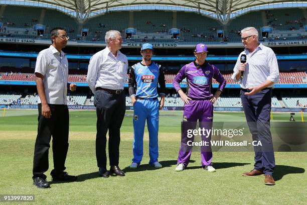 Travis Head of the Strikers and George Bailey of the Hurricanes look on at the coin toss during the Big Bash League Final match between the Adelaide...