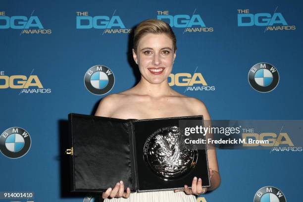 Director Greta Gerwig, recipient of the Nomination Medallion for Outstanding Directorial Achievement in Feature Film for 'Lady Bird', poses in the...