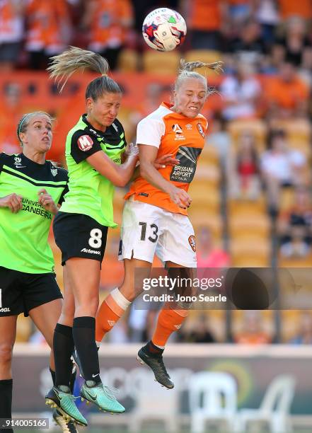 Canberra player Liana Danaskos and Brisbane player Tameka Butt contest the ball during the round 14 W-League match between the Brisbane Roar and...