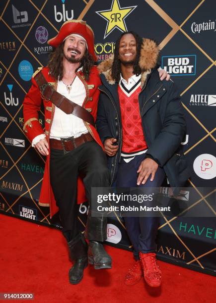 Captain Morgan and NFL player Todd Gurley II strike the legendary Captain Morgan pose on the red carpet at the 2018 Maxim Party on February 3, 2018...