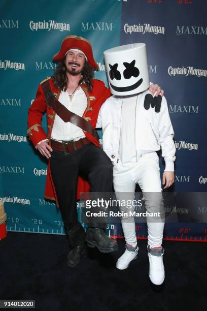 Captain Morgan and Marshmello strike the legendary Captain Morgan pose on the red carpet at the 2018 Maxim Party on February 3, 2018 in Minneapolis,...