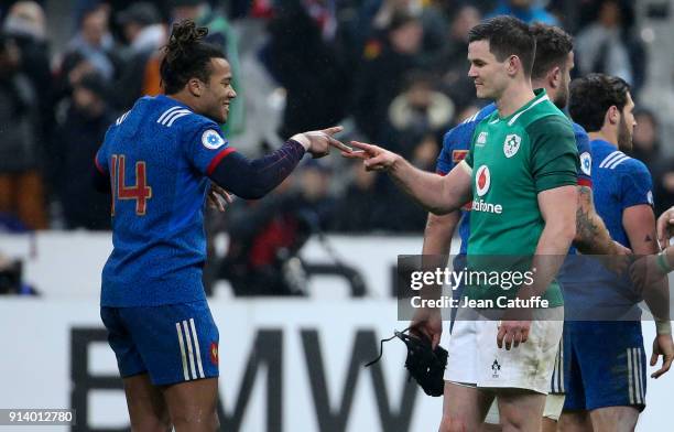Jonathan Sexton of Ireland greets former teammate Teddy Thomas of France following the NatWest 6 Nations match between France and Ireland at Stade de...