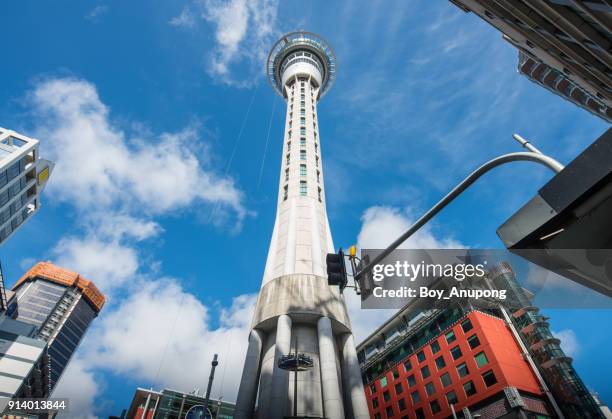 auckland sky tower an iconic observation landmark in auckland, new zealand. - sky tower stock pictures, royalty-free photos & images