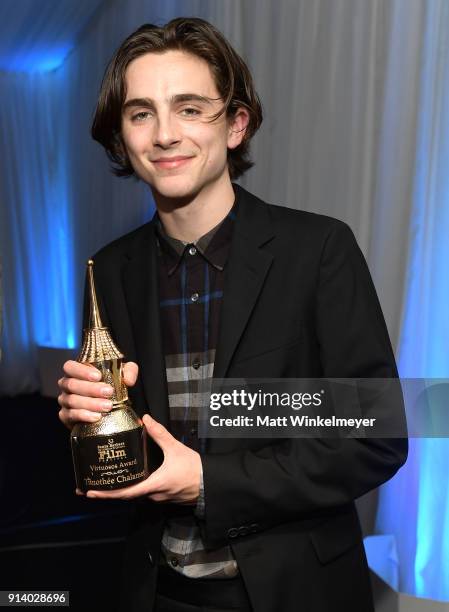 Actor Timothee Chalamet poses with their Virtuosos Awards at the Virtuosos Award Presented By UGG during The 33rd Santa Barbara International Film...
