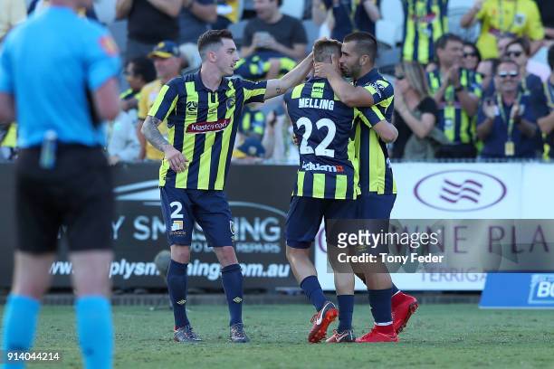 Petros Skapetis of the Mariners celebrates a goal with team mates during the round 19 A-League match between the Central Coast Mariners and the...