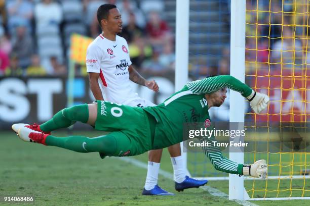 Vedran Janjetovic of the Wanderers dives to attempt a save during the round 19 A-League match between the Central Coast Mariners and the Western...