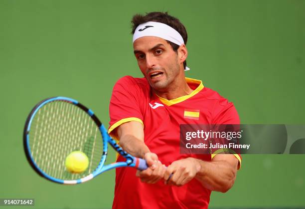 Albert Ramos-Vinolas of Spain plays a backhand in his match against Cameron Norrie of Great Britain during day three of the Davis Cup World Group...