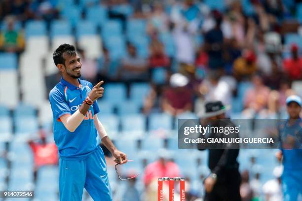 Indian bowler Yuzvendra Chahal celebrates the dismissal of South African batsman Chris Morris during the second One Day International cricket match...