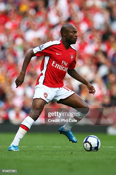 William Gallas of Arsenal runs with the ball during the Barclays Premier League match between Arsenal and Blackburn Rovers at Emirates Stadium on...