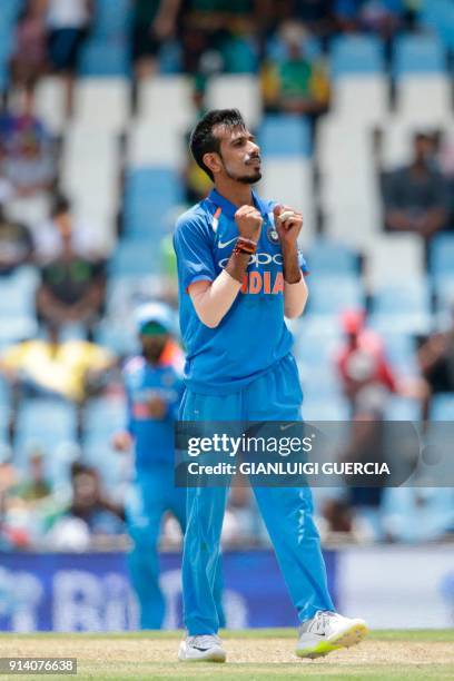 Indian bowler Yuzvendra Chahal celebrates the dismissal South African batsman Chris Morris during the second One Day International cricket match...