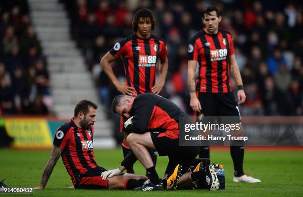 Steve Cook of Bournemouth lies on the floor after appearing to pick up and injury during the Premier League match between AFC Bournemouth and Stoke...