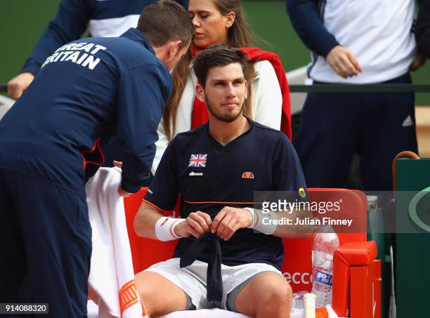 Cameron Norrie of Great Britain with captain Leon Smith in his match against Albert Ramos-Vinolas of Spain during day three of the Davis Cup World...