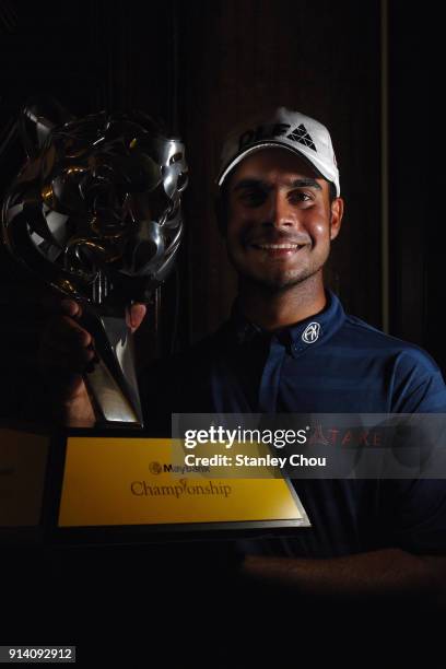 Shubhankar Sharma of India poses with the Maybank Championship trophy after he won it 21 under 267 during day four of the Maybank Championship...