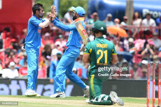 Yuzvendra Chahal of India celebrates the wicket of JP Duminy of the Proteas with Virat Kohli of India during the 2nd Momentum ODI match between South...