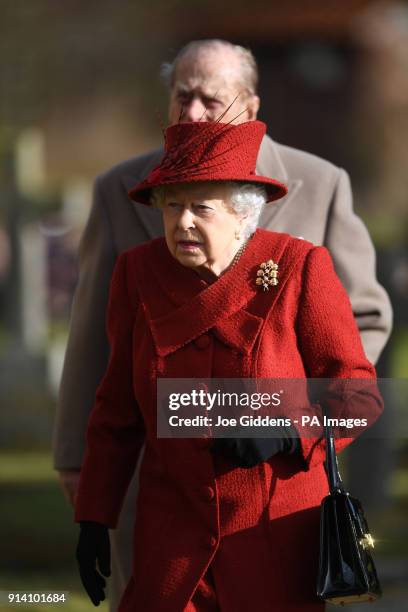 Queen Elizabeth II and the Duke of Edinburgh attending St Peter and Paul Church in West Newton, Norfolk, for a Sunday morning service.