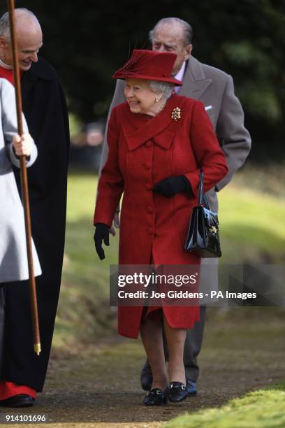 Queen Elizabeth II and the Duke of Edinburgh attending St Peter and Paul Church in West Newton, Norfolk, for a Sunday morning service.