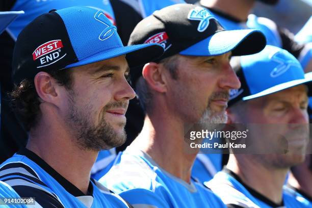 Travis Head of the Strikers looks on while the official team photo is taken during the Big Bash League Final match between the Adelaide Strikers and...