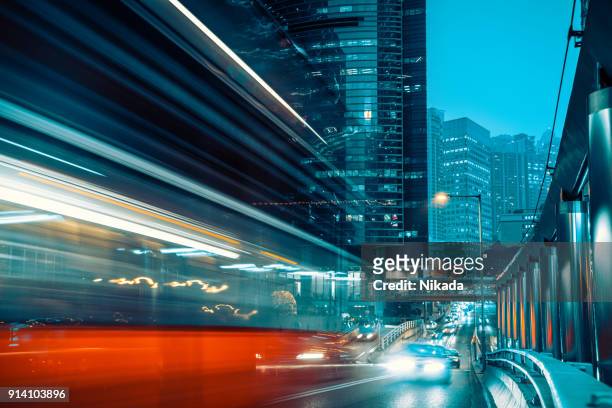 traffic trough hongkong business district - traffic management stock pictures, royalty-free photos & images