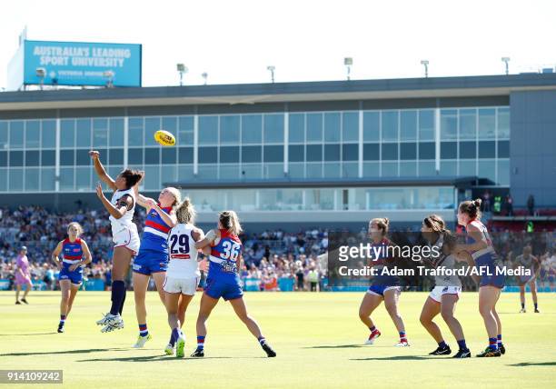 Alicia Janz of the Dockers and Aasta OâConnor of the Bulldogs compete in a ruck contest during the 2018 AFLW Round 01 match between the Western...