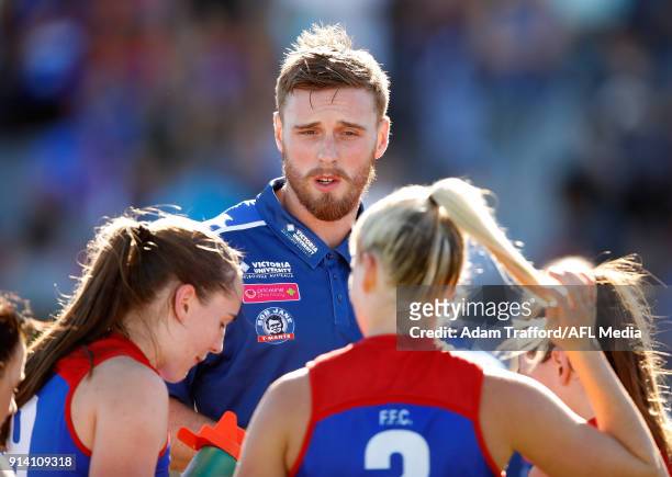 Jordan Roughead, Assistant Coach of the Bulldogs chats to players during the 2018 AFLW Round 01 match between the Western Bulldogs and the Fremantle...