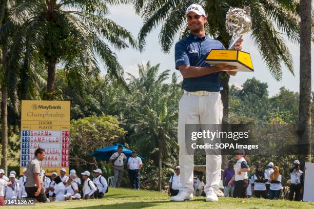 Shubhankar Sharma pro golf player from India poses with the Maybank Championship trophy after he won by the score of 21 under 267 during day four....