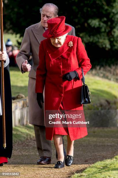 Queen Elizabeth II and Prince Philip, Duke of Edinburgh attend Sunday Service at St Peter and St Paul Church in West Newton on February 4, 2018 in...