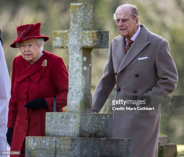 Queen Elizabeth II and Prince Philip, Duke of Edinburgh attend Sunday Service at St Peter and St Paul Church in West Newton on February 4, 2018 in...