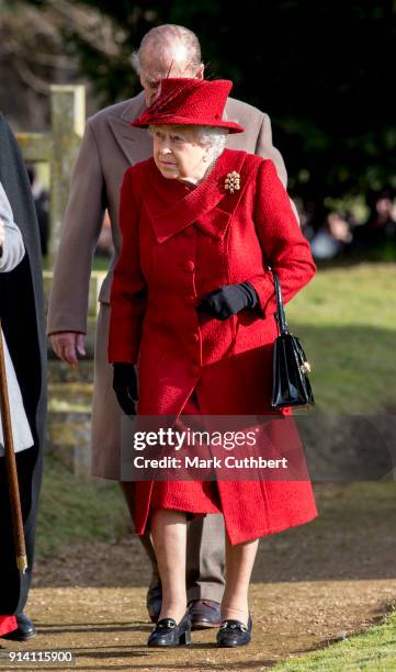 Queen Elizabeth II and Prince Philip, Duke of Edinburgh attend Sunday Service at St Peter and St Paul Church in West Newton on February 4, 2018 in...