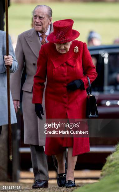 Queen Elizabeth II and Prince Philip, Duke of Edinburgh attend Sunday Service at St Peter and St Paul Church in West Newton on February 4, 2018 in...