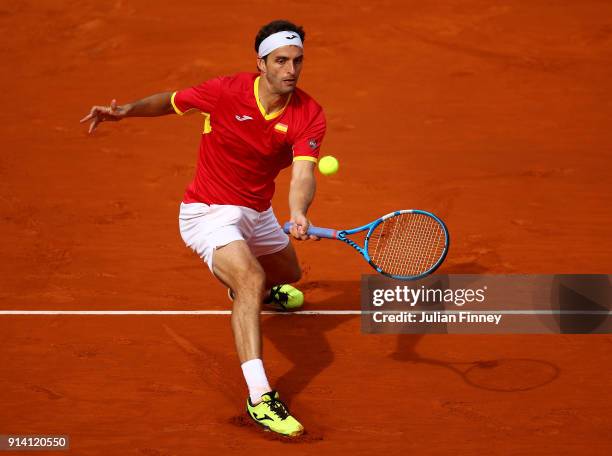 Albert Ramos-Vinolas of Spain plays a volley in his match against Cameron Norrie of Great Britain during day three of the Davis Cup World Group first...