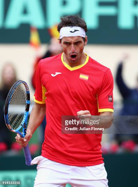 Albert Ramos-Vinolas of Spain celebrates a point against Cameron Norrie of Great Britain in four sets during day three of the Davis Cup World Group...