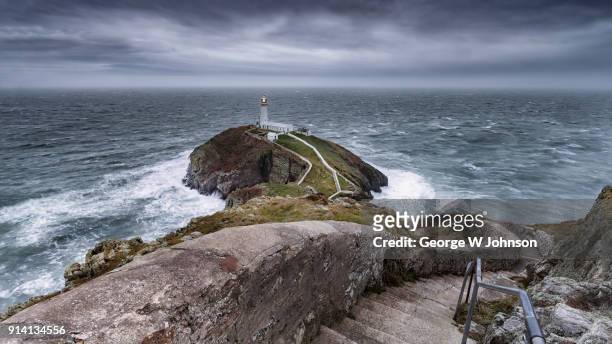 winter at south stack lighthouse - anglesey wales stock pictures, royalty-free photos & images