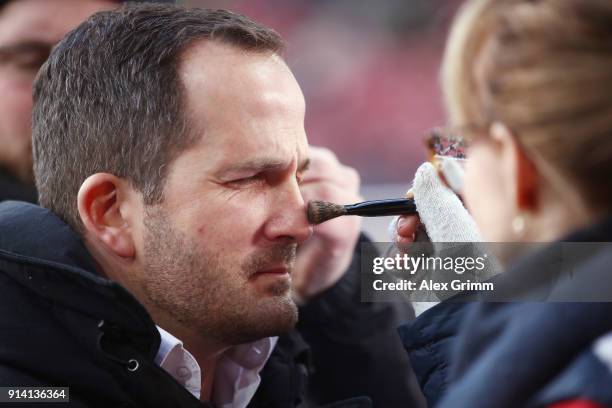 Head coach Manuel Baum of Augsburg is prepared for an interview prior to during the Bundesliga match between FC Augsburg and Eintracht Frankfurt at...