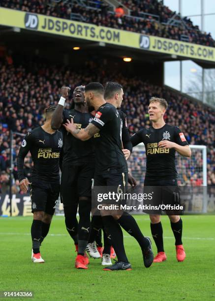 Mohamed Diame of Newcastle United celebrates scoring the opening goal with team mates during the Premier League match between Crystal Palace and...