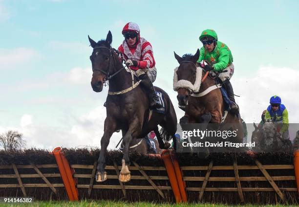 Dublin , Ireland - 4 February 2018; Total Recall, with Paul Townend up, left, clear the last next to Shantou Bob, with Robbie Power up, during the...