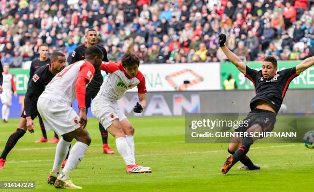 Augsburg's Korean midfielder Koo Ja-Cheol scores the first goal during the German first division Bundesliga football match 1 FC Augsburg vs Eintracht...