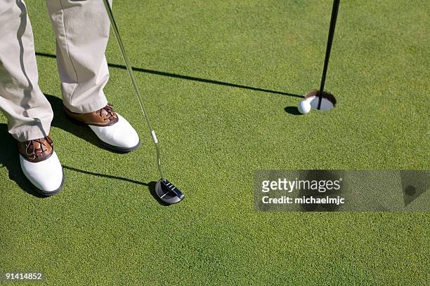 get in the hole - golf short iron stock pictures, royalty-free photos & images